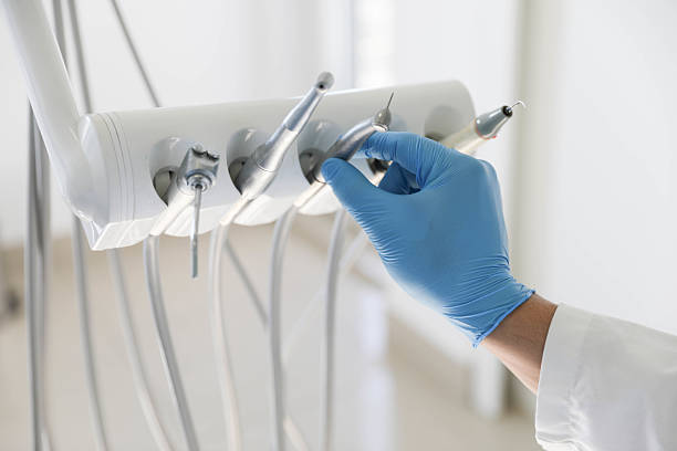 Professional Root Canal Treatment technician working in New Philadelphia, OH